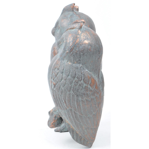 388 - 20th century cast copper owl sculpture depicting two owls sitting on a branch. Makers unknown. Measu... 