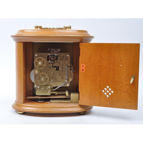 390 - Franz Hermle & John - Westminster chime vintage 20th century mantel clock. With a Seth Thomas mo... 