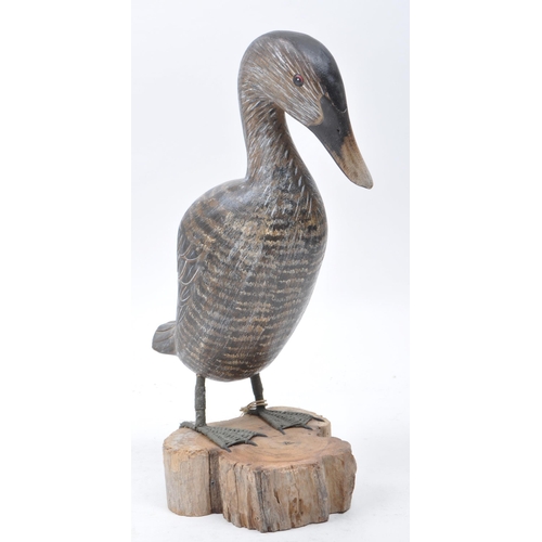 392 - Collection of late 20th century duck and chicken decorative figures, comprised of a carved wooden du... 