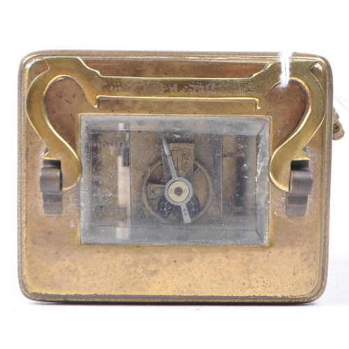 398 - 20th brass carriage clock, with a Roman numeral chapter ring on white enamel face. Bevelled glass to... 