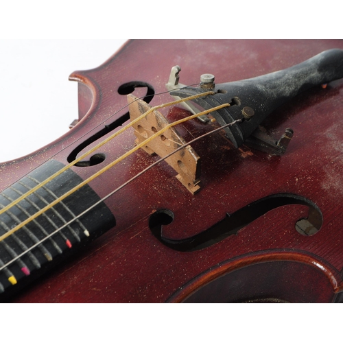 406 - An early 20th century The London Manby Violin Co. 3/4 size mahogany violin. The violin labelled to i... 