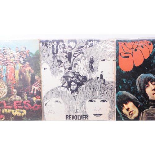 411 - The Beatles - Six late 20th century LP vinyl records. Comprised of Abbey Road PCS 7088 -2/-1, A Hard... 