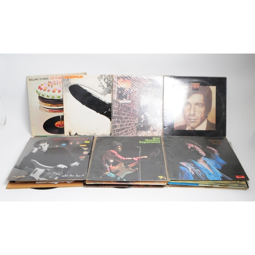 414 - Collection of late 20th century rock LP vinyl records. Artists including Led Zeppelin, Rolling Stone... 