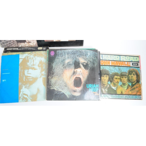 414 - Collection of late 20th century rock LP vinyl records. Artists including Led Zeppelin, Rolling Stone... 