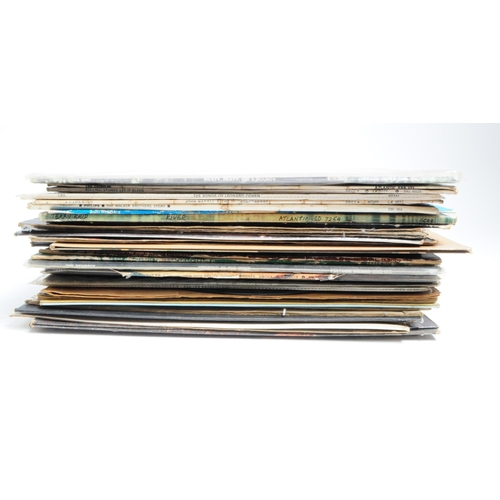 414 - Collection of late 20th century rock LP vinyl records. Artists including Led Zeppelin, Rolling Stone... 