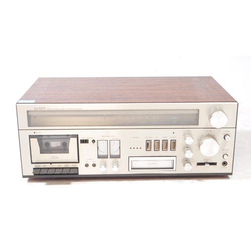 421 - Lloyds - A vintage AM/FM Stereo / Cassette / 8 Track Recorder deck model number R751 series 753A. Se... 