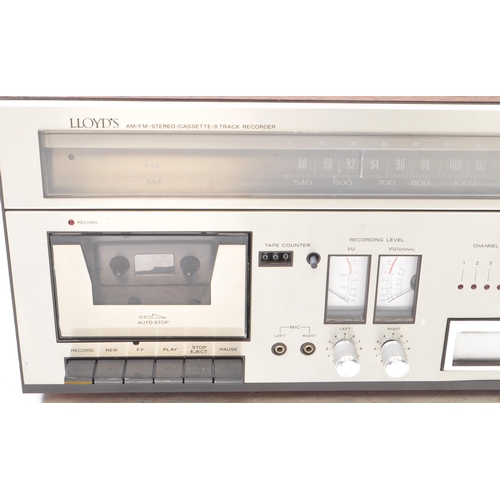 421 - Lloyds - A vintage AM/FM Stereo / Cassette / 8 Track Recorder deck model number R751 series 753A. Se... 