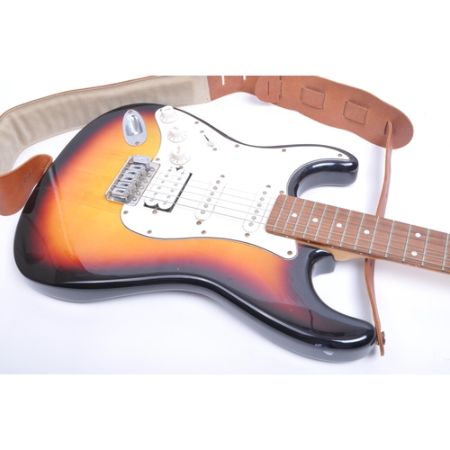 427 - Cruiser by Crafter - With chrome tuning pegs, white scratchboard in the sunburst design to body. Wit... 