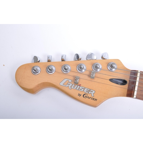 427 - Cruiser by Crafter - With chrome tuning pegs, white scratchboard in the sunburst design to body. Wit... 