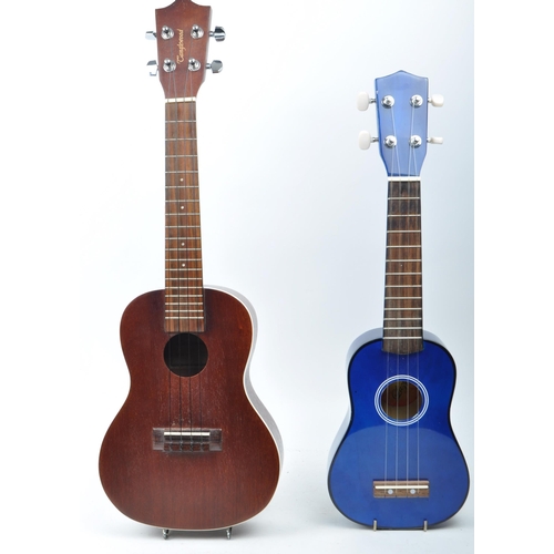 429 - Tanglewood ukulele string musical instrument. Together with an electric blue Lazy ukulele. Model num... 