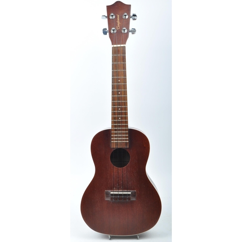 429 - Tanglewood ukulele string musical instrument. Together with an electric blue Lazy ukulele. Model num... 