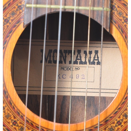 431 - Montana 1970s acoustic guitar musical instrument with hard case. Model number KC 492