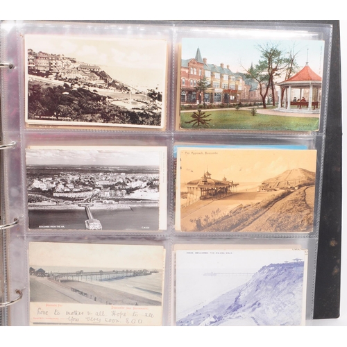 487 - A collection of early and mid 20th century British Holiday postcards. The collection features a larg... 