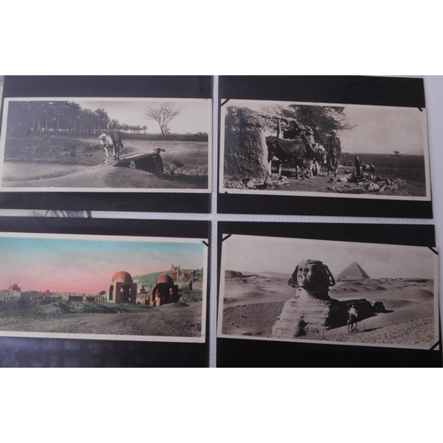 517 - Collection of early 20th century Egypt photographic postcards, including black and white, and hand c... 