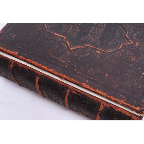 520 - Large Victorian family holy bible with leather cover and brass clasps and corners. Measuring approx.... 