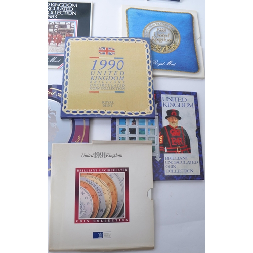 541 - Royal Mint - 1980s and 1990s brilliant uncirculated annual coin collection packs, comprised of years... 