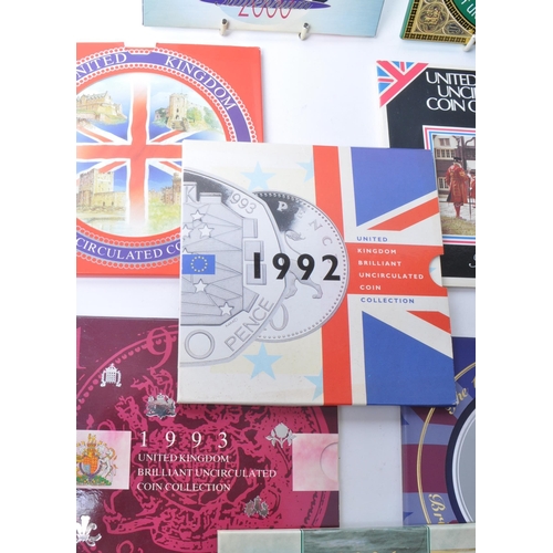 541 - Royal Mint - 1980s and 1990s brilliant uncirculated annual coin collection packs, comprised of years... 