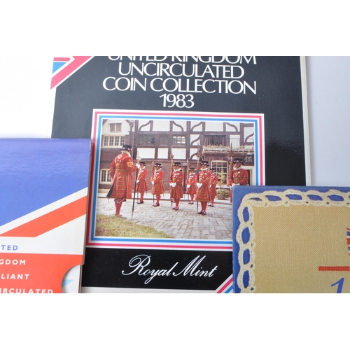 541 - Royal Mint - 1980s and 1990s brilliant uncirculated annual coin collection packs, comprised of years... 