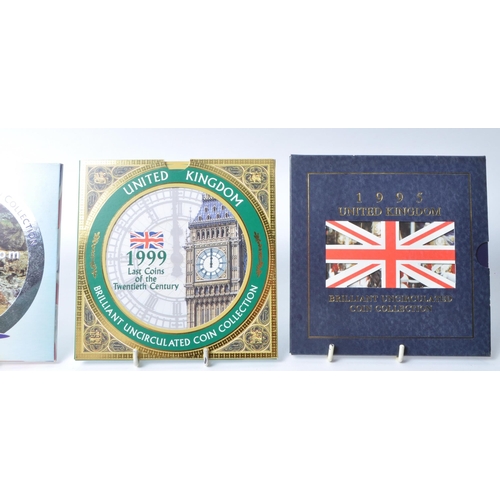 541 - Royal Mint - 1980s and 1990s brilliant uncirculated annual coin collection packs, comprised of years... 