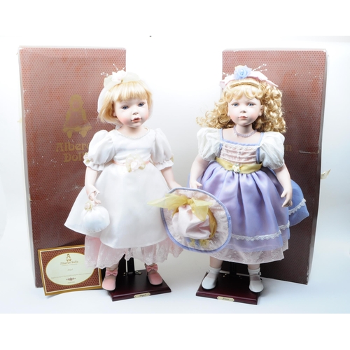 62 - Alberon Dolls - Collection of two late 20th century porcelain dolls, comprised of Angel LP8439 and J... 