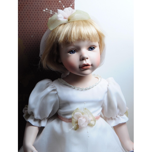 62 - Alberon Dolls - Collection of two late 20th century porcelain dolls, comprised of Angel LP8439 and J... 