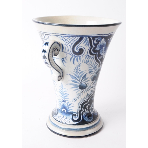 63 - Villeroy & Boch - Early 20th century ceramic twin handled delft style vase. Featuring a black an... 