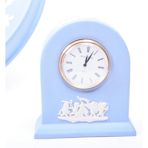 68 - Wedgwood - Jasperware - Three 20th century sky blue porcelain clocks, comprised of a circular wall c... 