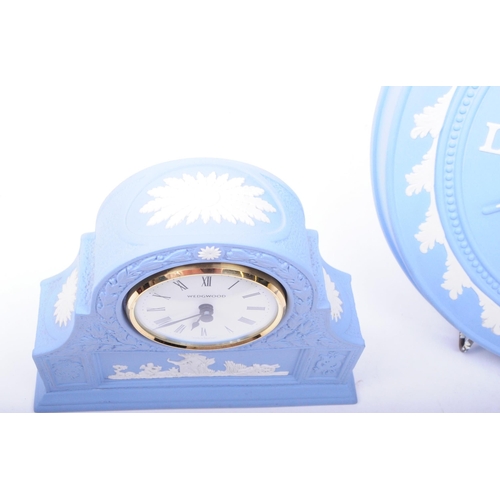 68 - Wedgwood - Jasperware - Three 20th century sky blue porcelain clocks, comprised of a circular wall c... 