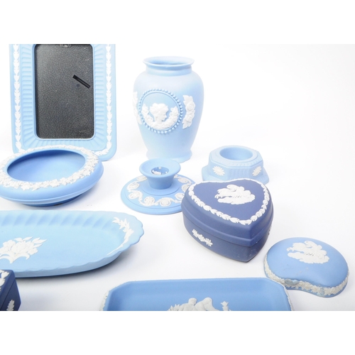 74 - Wedgwood - Jasperware - A collection of vintage 20th century sky blue and dark blue bisque porcelain... 