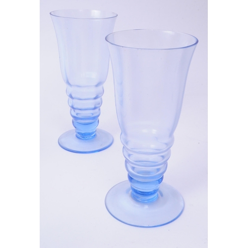 79 - A vintage mid 20th century blue glass lemonade set. To consist of six glasses, alongside a pitcher. ... 