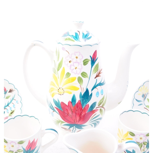 84 - Midwinter - A vintage mid 20th century Midwinter china coffee service. The service having white grou... 