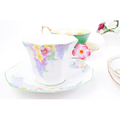 93 - Collection of 20th century bone china tea cups, teapots and more. Makers including Royal Albert, Ayn... 