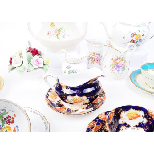 93 - Collection of 20th century bone china tea cups, teapots and more. Makers including Royal Albert, Ayn... 