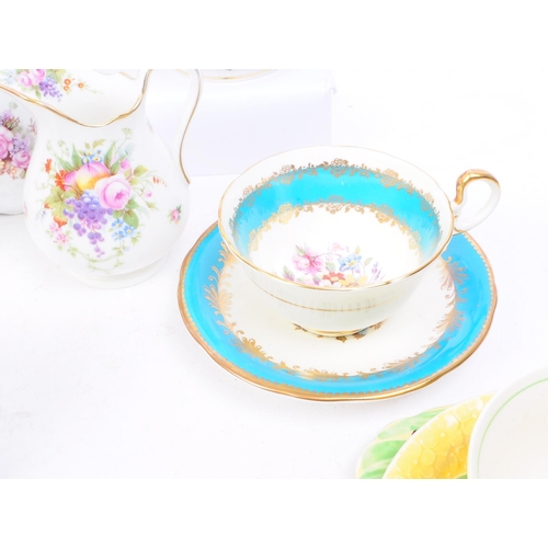 93 - Collection of 20th century bone china tea cups, teapots and more. Makers including Royal Albert, Ayn... 