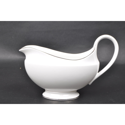 139 - Wedgwood - A vintage 20th century Wedgwood Signet Platinum bone china part dinner service, alongside... 