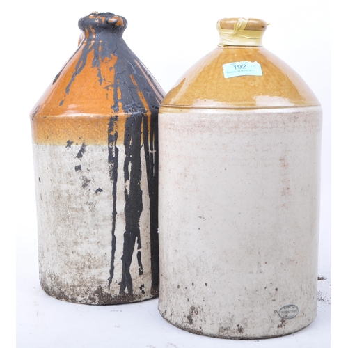 192 - Collection of local interest stoneware flagons jugs. Two tone colourway with carry handle, text to f... 