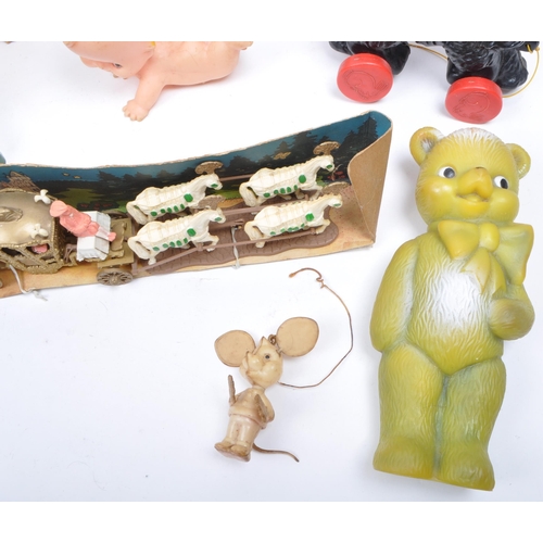 208 - A collection of assorted late 20th century vintage toys. Examples including a HCF Basil Brush figure... 