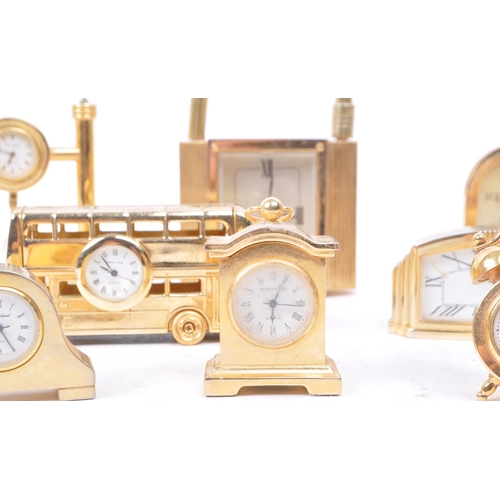 226 - Park Lane - Collection of late 20th century miniature brass clocks, mostly by Park Lane. Clocks moun... 