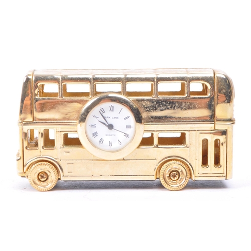 226 - Park Lane - Collection of late 20th century miniature brass clocks, mostly by Park Lane. Clocks moun... 