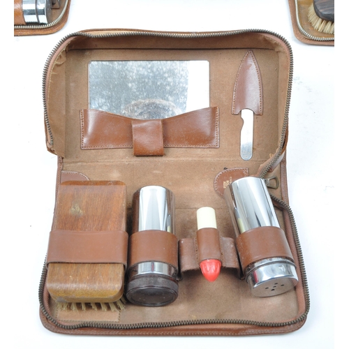 399 - A large collection of vintage 20th century travelling case vanity sets. Seven in total in the brown ... 