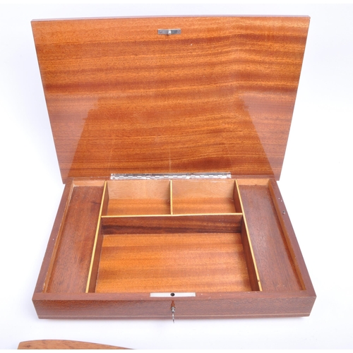 424 - 1941 Reuge Swiss music box housed in an Italian mahogany inlaid topped box with four tapering legs. ... 