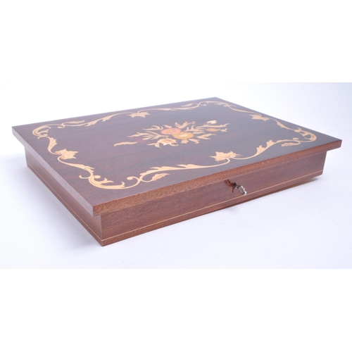 424 - 1941 Reuge Swiss music box housed in an Italian mahogany inlaid topped box with four tapering legs. ... 