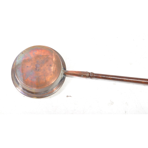 441 - Victorian 19th century copper bed pan. Features hinged lid and wooden turned handle. Measuring appro... 