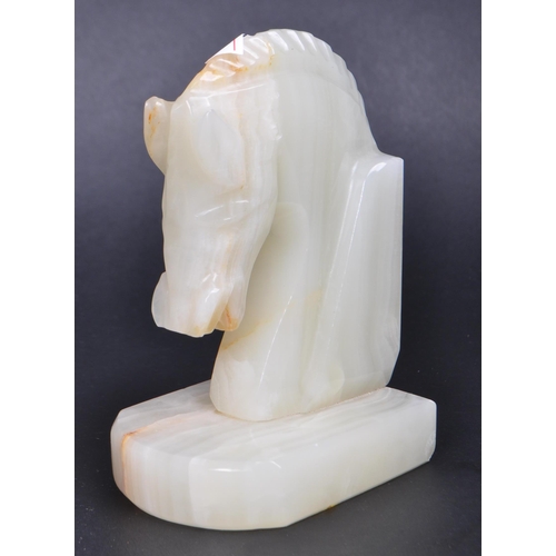 454 - Pair mid century horse onyx book ends. Rectangular plinth base with horse bust to top AF.(13cm heigh... 