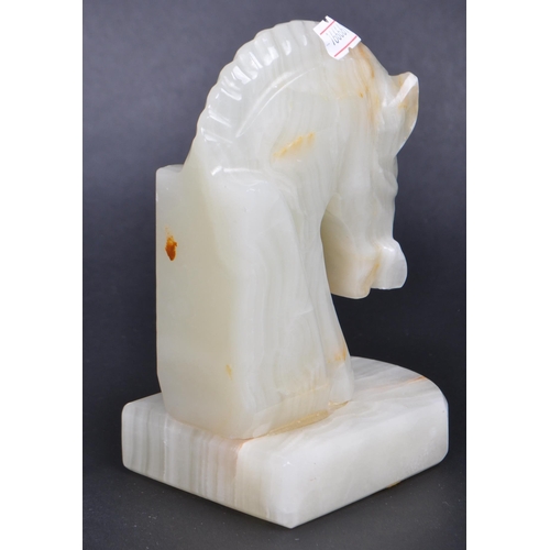 454 - Pair mid century horse onyx book ends. Rectangular plinth base with horse bust to top AF.(13cm heigh... 