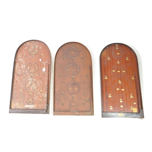 457 - Three early 20th century wooden bagatelle boards, comprised of a Corinthian 21T, an Amersham Scora B... 