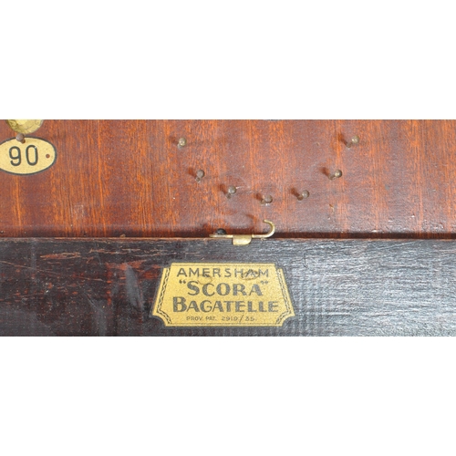 457 - Three early 20th century wooden bagatelle boards, comprised of a Corinthian 21T, an Amersham Scora B... 