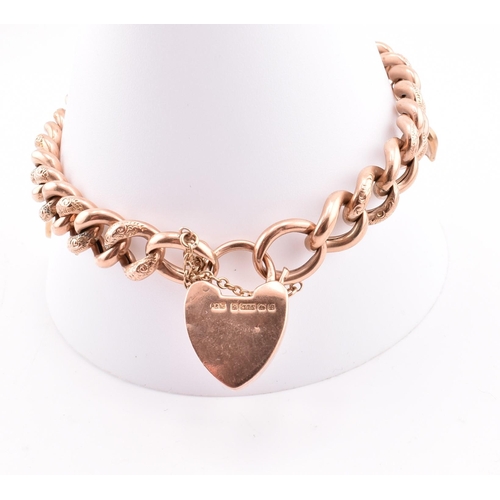 103 - A hallmarked 9ct gold engraved charm bracelet. The 9ct rose gold curb link bracelet having polished ... 