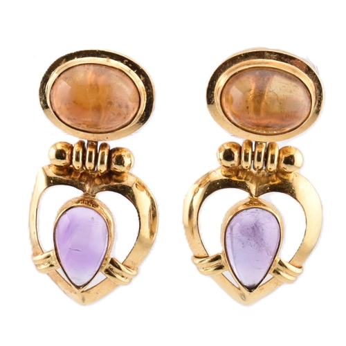 114 - A pair of 18ct gold citrine and amethyst pendant earrings. The 18ct yellow gold earrings set with te... 