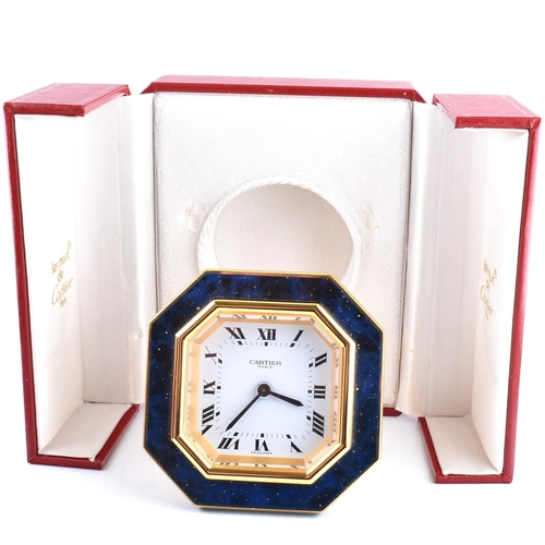 13 - Cartier Les Must de Cartier Paris simulated lapis lazuli travel clock. The clock with manual-wind mo... 